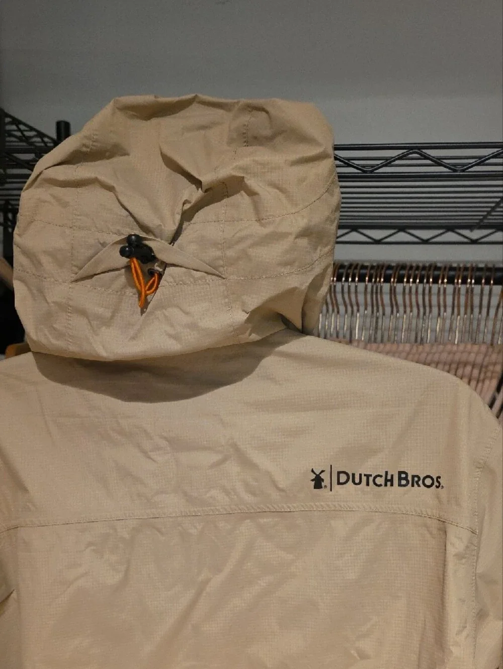 Dutch Bros Beige Windbreaker with Orange Trim